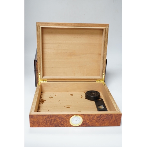 503 - Two burr wood humidors, one with contents including Cohiba