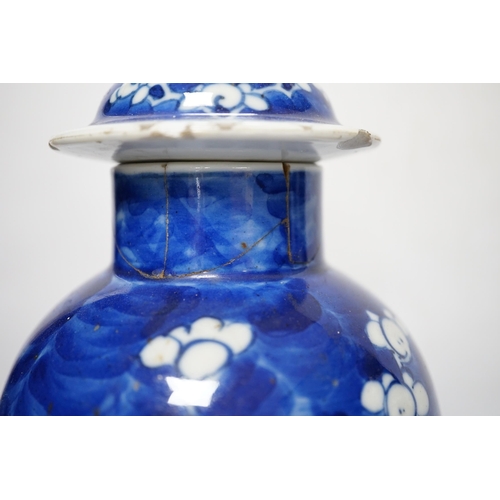 504 - Five early 20th century Chinese blue and white prunus vases and covers, tallest 31cm