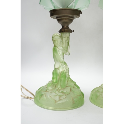 508 - A pair of Art Deco press glass figural table lamps, 40cm