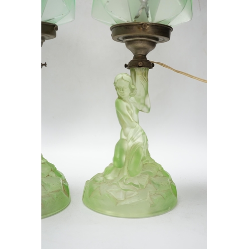 508 - A pair of Art Deco press glass figural table lamps, 40cm