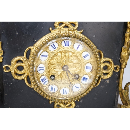 516 - An early 20th century gilt-metal mounted mantel clock with bacchanalian group surmount, 44cm