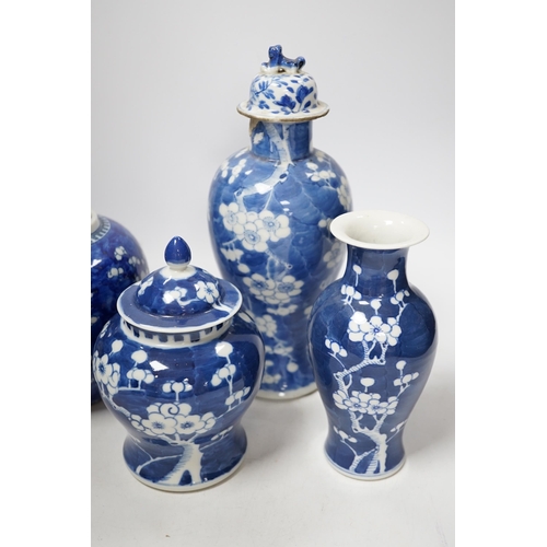 523 - Two Chinese prunus jars and two vases, early 20th century, tallest 26cm