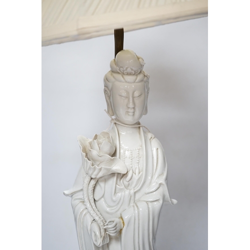 536 - A Chinese blanc de chine figure of Guanyin, 71cm with shade