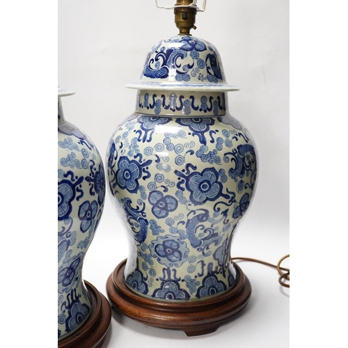 542 - A pair of modern Chinese blue and white table lamps