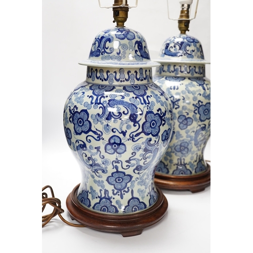 542 - A pair of modern Chinese blue and white table lamps