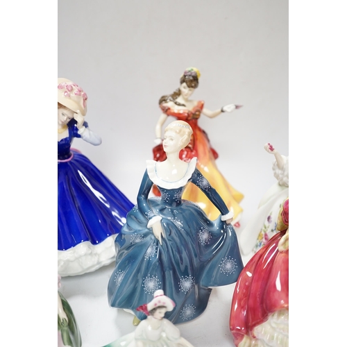 552 - Seven Royal Doulton figurines, (two boxed), tallest 21cm