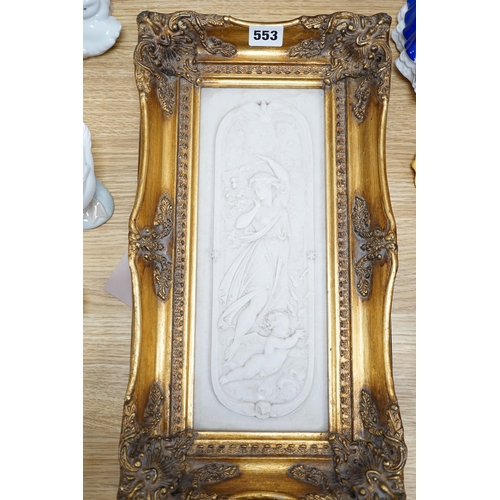 553 - An ornate framed reconstituted stone frieze, 42 x 23cm