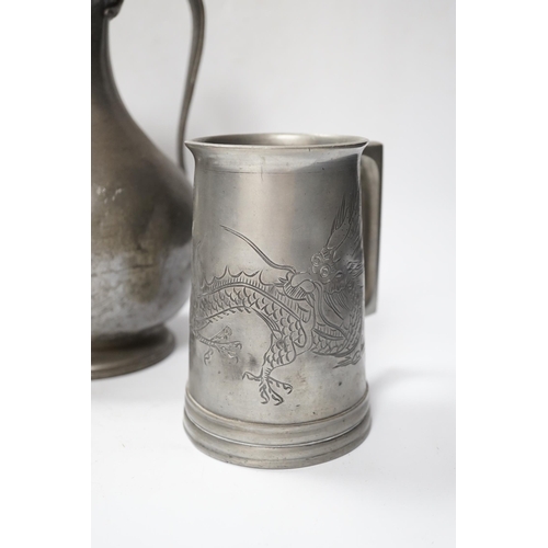 555 - Six pewter items including an 18th-century Continental wriggle work tankard, two more tankards and t... 