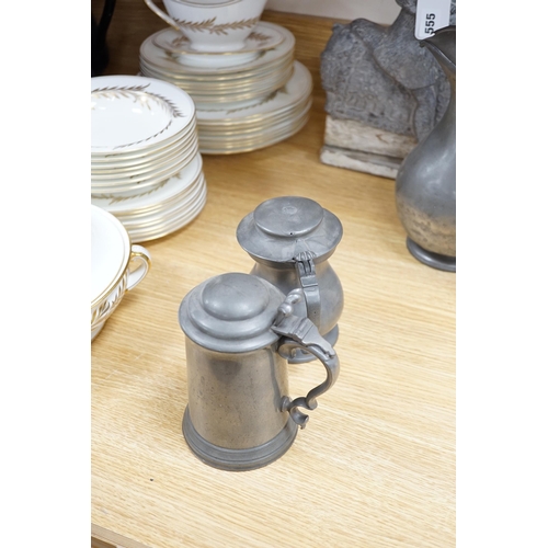 555 - Six pewter items including an 18th-century Continental wriggle work tankard, two more tankards and t... 