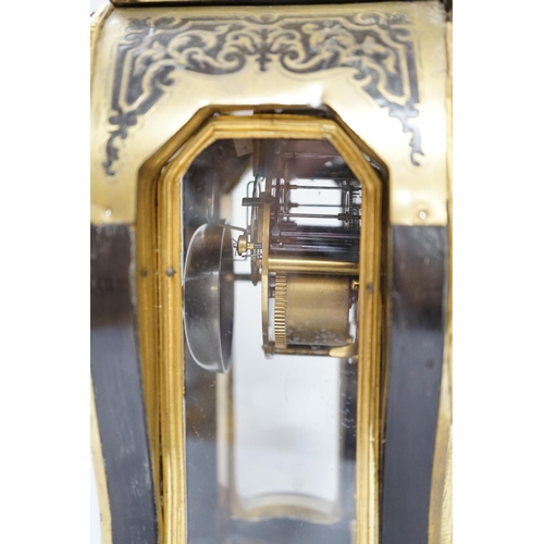 558 - A large Louis XV style cut brass inlaid mantel clock, with a two train, French movement, striking on... 