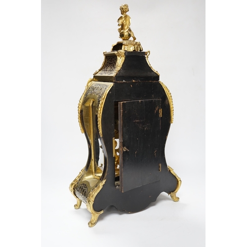 558 - A large Louis XV style cut brass inlaid mantel clock, with a two train, French movement, striking on... 