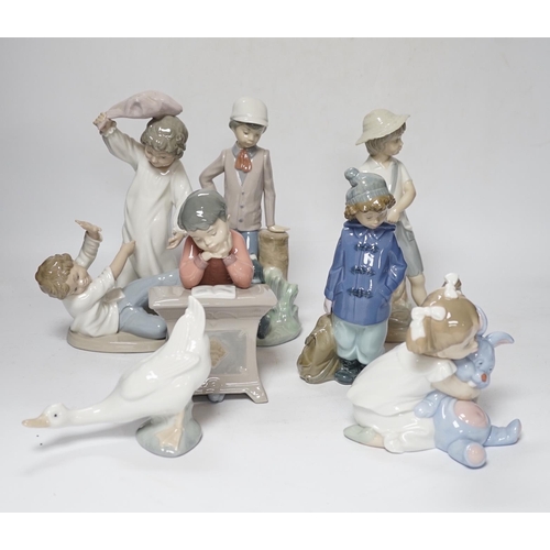 562 - Six mixed Nao figure groups of children play and a duck, four boxed, tallest 23.5cm (7)