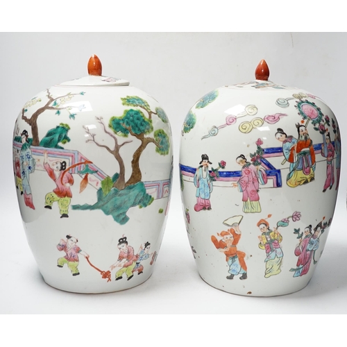 564 - A pair of Chinese famille rose ovoid jar and covers, 32cm high