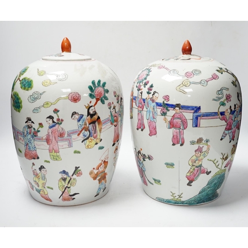 564 - A pair of Chinese famille rose ovoid jar and covers, 32cm high