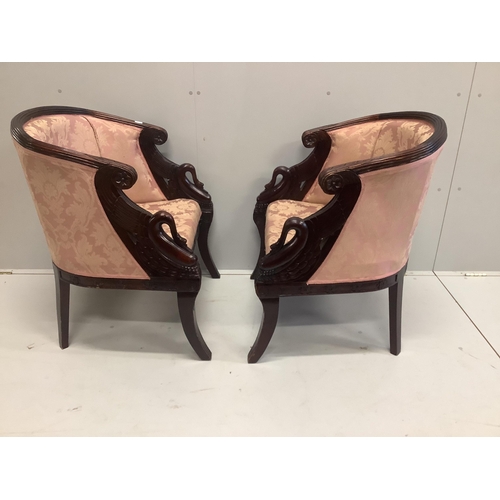 63 - A pair of reproduction Empire style mahogany tub framed chairs, width 68cm, depth 54cm, height 86cm... 