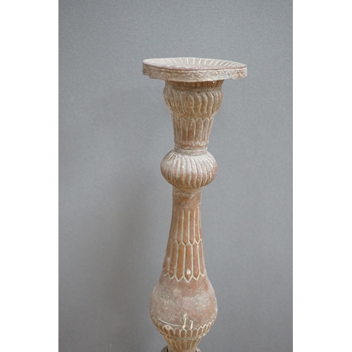 645 - An Islamic copper candle stand, 19th/early 20th century, 97cm high