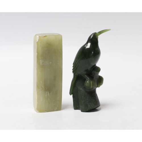 654 - * * A carved spinach green jade model of a bird and a Chinese soapstone scroll weight, largest 7cm h... 