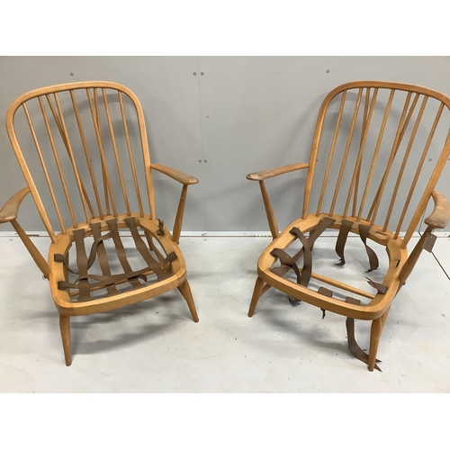 81 - A pair of Ercol beech armchairs, width 70cm, depth 78cm, height 86cm