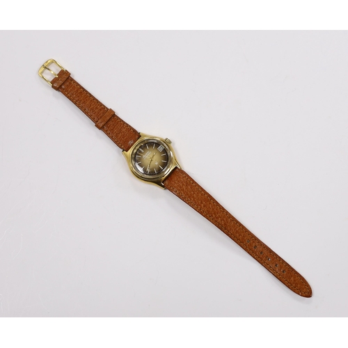 967 - A lady's steel and gold plated Bulova Accutron wrist watch, on a leather strap.