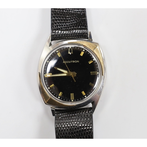 972 - A gentleman's stainless steel Bulova Accutron wrist watch, with black dial, on an Accutron strap, ca... 