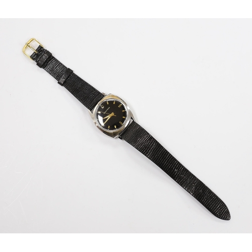 972 - A gentleman's stainless steel Bulova Accutron wrist watch, with black dial, on an Accutron strap, ca... 