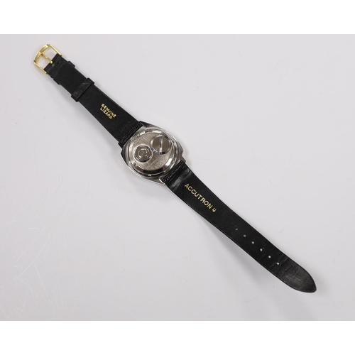 972 - A gentleman's stainless steel Bulova Accutron wrist watch, with black dial, on an Accutron strap, ca... 