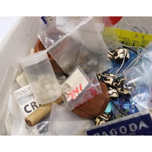 986 - A quantity of assorted jewellery related items including loose beads, bolt rings, thread, copper wir... 