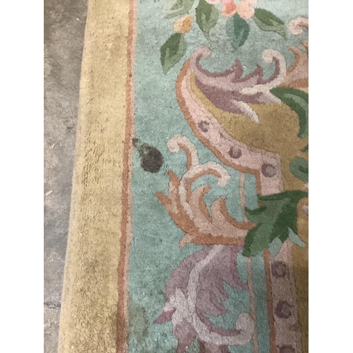 102 - A Chinese gold ground carpet, 360 x 270cm