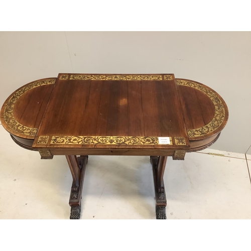 1047 - A Regency cut brass inlaid rosewood table with twin hinged flap top, lacks silks box, width 94cm, de... 