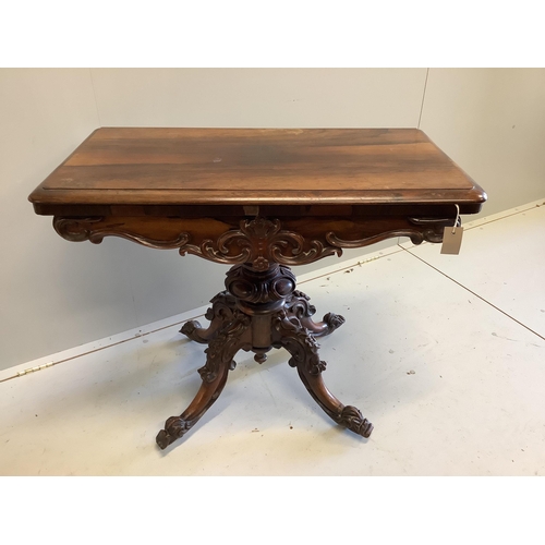 1067 - An early Victorian rosewood rectangular folding card table, width 89cm, depth 46cm, height 75cm... 