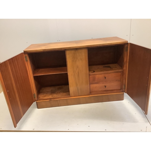 1111 - An Art Deco style banded walnut sideboard, width 136cm, depth 48cm, height 90cm