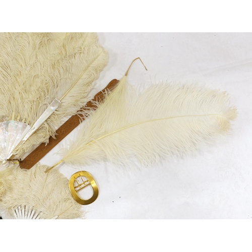 1279 - A Regency sequin and horn fan, a bone brise fan, a large white feather fan and a similar miniature f... 