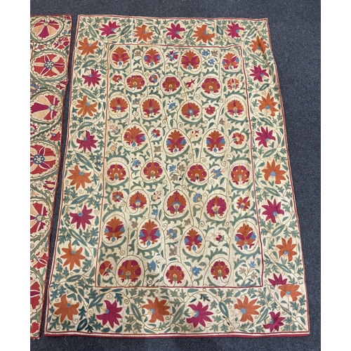 1333 - Two Uzbekistan Suzani, late 19th / early 20th century, embroidered hangings, on thick cotton, conver... 