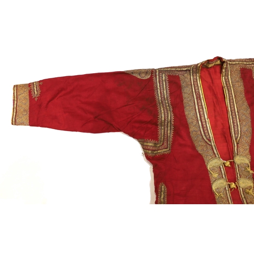 1338 - A late 19th century gentlemans quilted red silk Indian Chogha, embroidered with ornate gold and sil... 