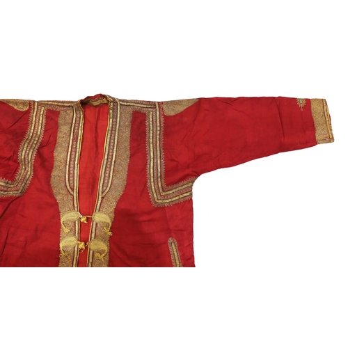 1338 - A late 19th century gentlemans quilted red silk Indian Chogha, embroidered with ornate gold and sil... 