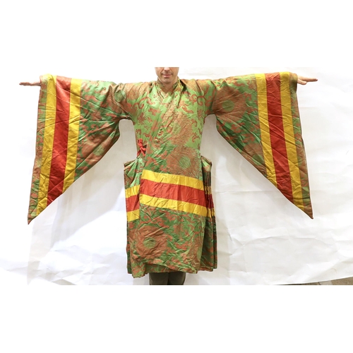 1339 - An unusual early 20th century Japanese silk damask kimono, designed with pointed sleeves and wide pl... 