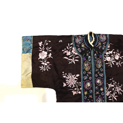 1341 - A Chinese early Republic blue silk embroidered robe with colourful ornately embroidered sleeve bands... 