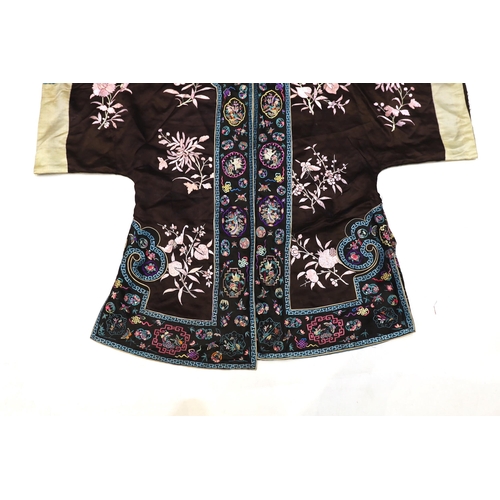 1341 - A Chinese early Republic blue silk embroidered robe with colourful ornately embroidered sleeve bands... 