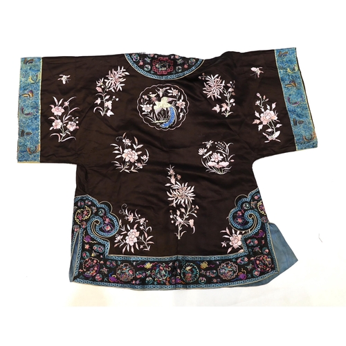 1341 - A Chinese early Republic blue silk embroidered robe with colourful ornately embroidered sleeve bands... 