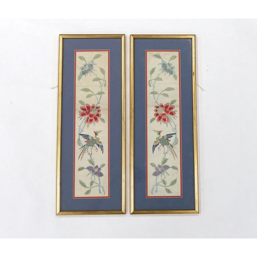 1343 - A pair of framed early 20th century Chinese cream silk polychrome silk embroidered sleeve bands, 11c... 