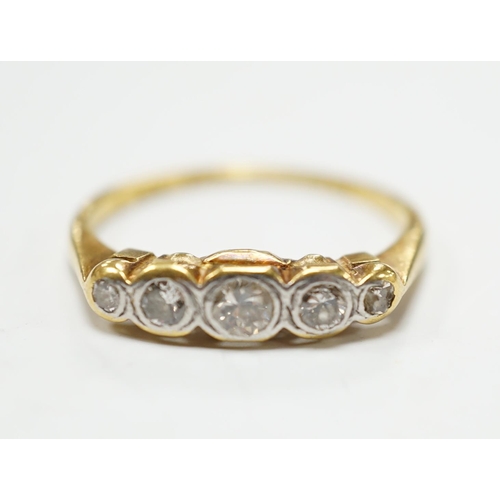 2001 - An 18ct, plat and graduated collet set five stone diamond half hoop ring, size P, gross weight 3.1 g... 