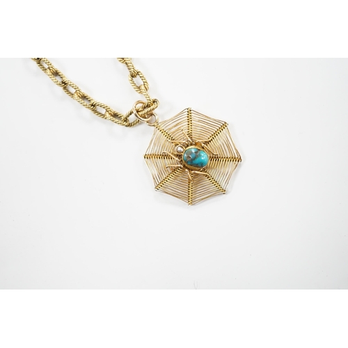 2009 - An early 20th century 9ct, turquoise and seed pearl set 'spider and web' pendant, 30mm, on a yellow ... 