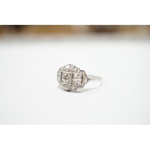 2010 - An Art Deco style white metal and millegrain set diamond cluster ring, size N/O, gross weight 4.1 gr... 