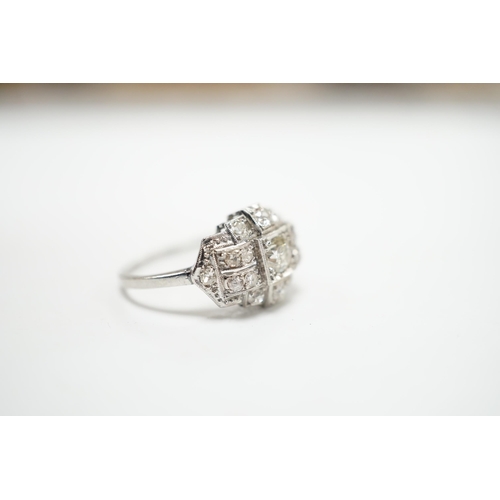 2010 - An Art Deco style white metal and millegrain set diamond cluster ring, size N/O, gross weight 4.1 gr... 