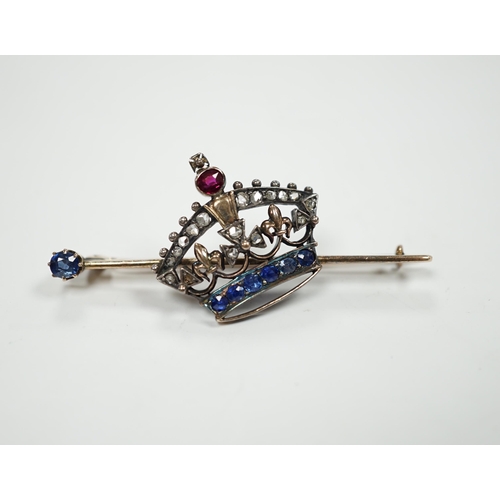 2014 - An Edwardian yellow metal, ruby, sapphire and rose cut diamond set coronet bar brooch, 50mm, gross w... 