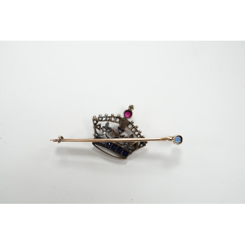 2014 - An Edwardian yellow metal, ruby, sapphire and rose cut diamond set coronet bar brooch, 50mm, gross w... 