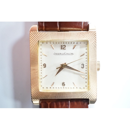 2015 - A gentleman's 18ct gold Jaeger LeCoultre manual wind dress wrist watch, with square dial, milled bez... 