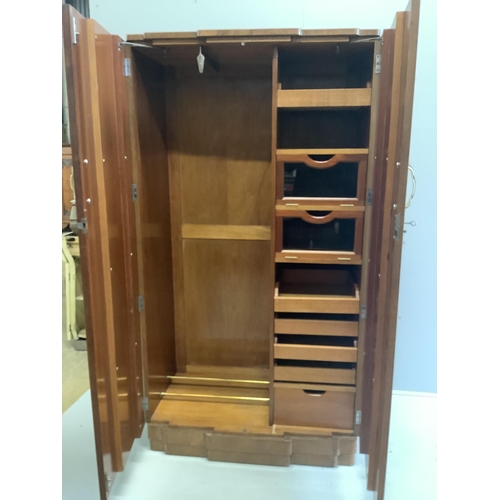 1001 - An Art Deco style burr walnut compactum wardrobe, width 96cm, depth 52cm, height 182cm