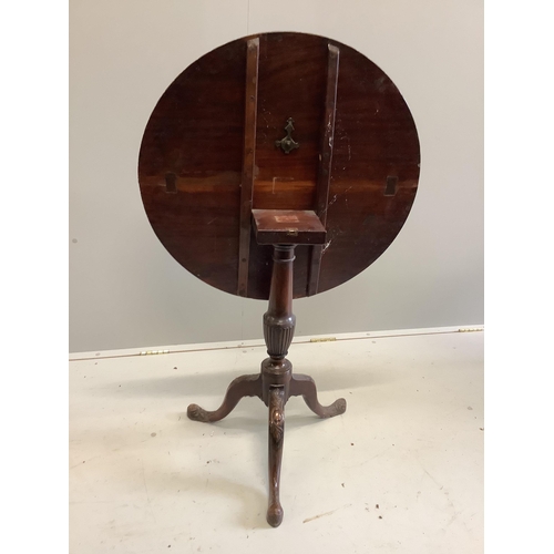 1011 - A George III style circular mahogany tilt top tripod tea table, diameter 76cm, height 72cm