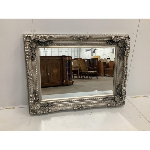 16 - A Victorian style rectangular silvered composition wall mirror, width 120cm, height 90cm